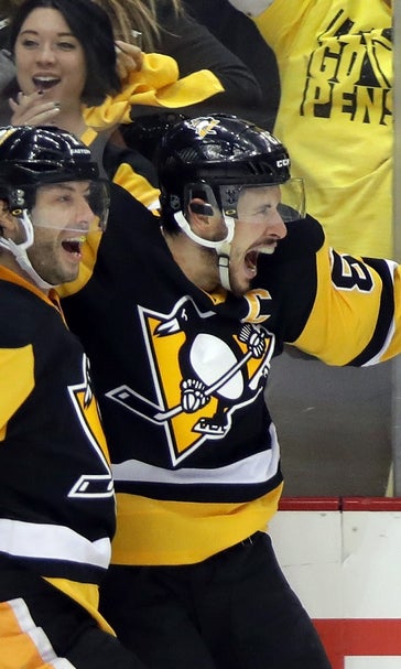 Sidney Crosby's OT winner fuels Penguins past Lightning to tie series